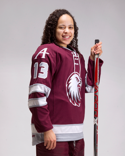 Nikki Nightengale shows off the new hockey jerseys